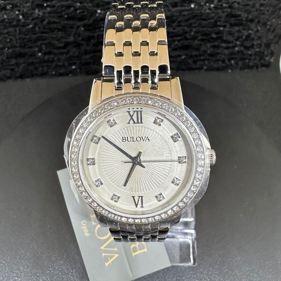 Women's (NWT) Silver Bulova with Mother-of-Pearl face, Diamond hours, & crystals - Picture 2 of 5